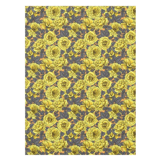 Gelbe Rosen mit grauen Blätter auf Orange Tischdecke (Vorderseite)