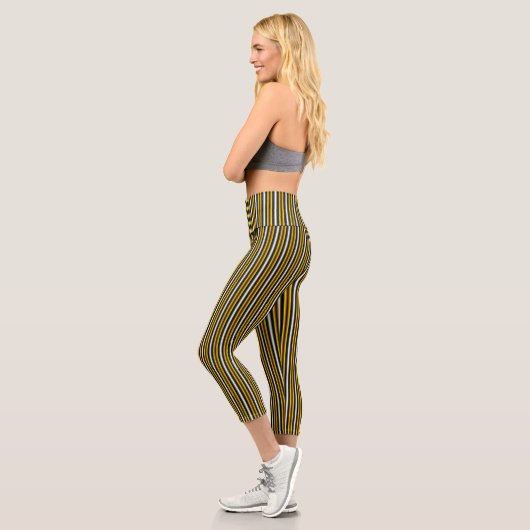 Gelbe Schwarz-weiße Regenbogenstreifen Capri Leggings (Links)