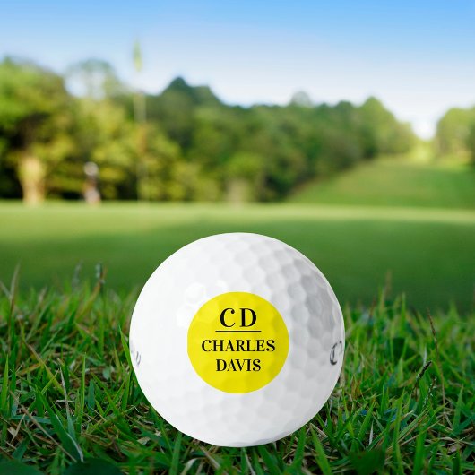Gelbe schwarze Monogramm-Initialen Golfball