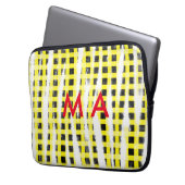 Gelbe schwarze Schachbrettmuster tragen den Namen Laptopschutzhülle (Vorderseite Links)