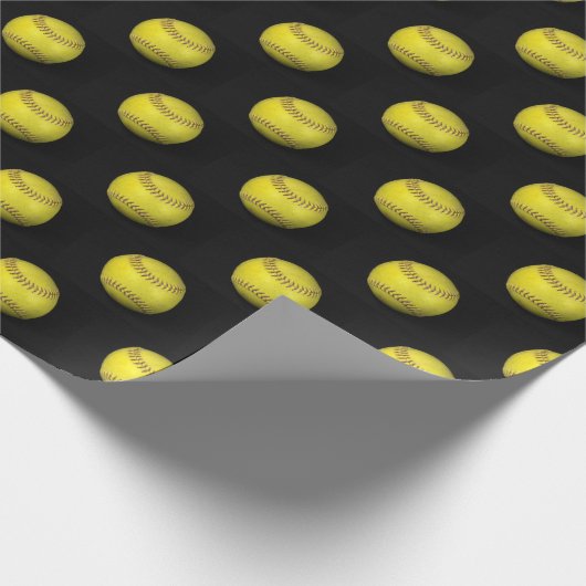 Gelbe Softball auf schwarz Geschenkpapier (Ecke)