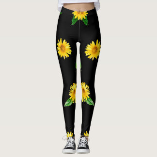 Gelbe Sonnenblume auf dunkelschwarzem Hintergrund Leggings