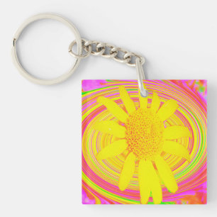 Gelbe Sonnenblume auf einem psychedelischen Swirl Schlüsselanhänger