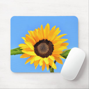 Gelbe Sonnenblume gegen Sonne an blauem Himmel - S Mousepad