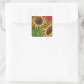 Gelbe Sonnenblumen auf rotem Aufkleber (Tasche)