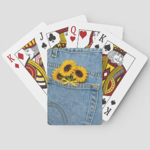 Gelbe Sonnenblumen in einer blauen Jeans Tasche Spielkarten