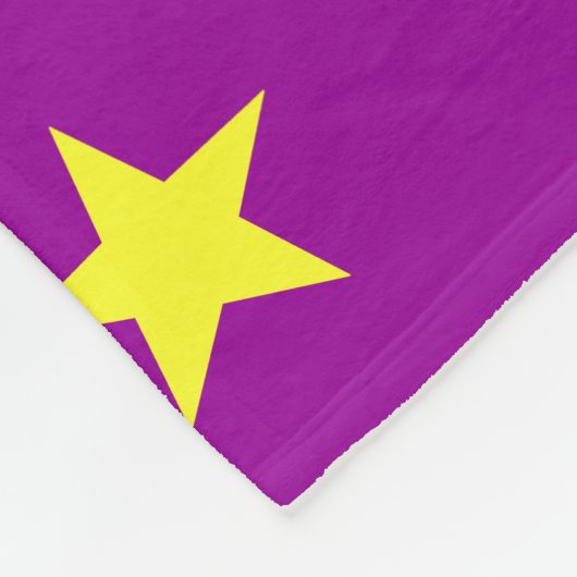 Gelbe Sterne auf lila Fleecedecke (Ecke)
