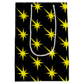 Gelbe Sterne, Schneeflocken, schwarze Mustergesche Mittlere Geschenktüte (Rückseite)