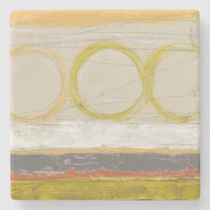 Gelbe u. orange Kreise auf mehrfarbigem Steinuntersetzer