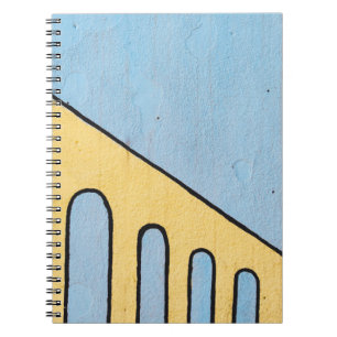 Gelbe und blaue Wanddekoration Notizblock