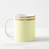 Gelbe und goldgeriebte Tasse (Links)