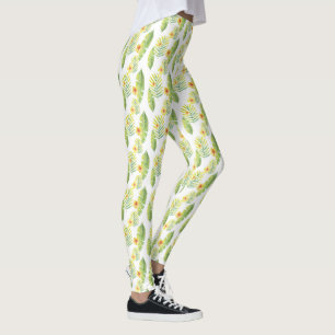 Gelbe und grüne tropische Blätter und Blume Leggings