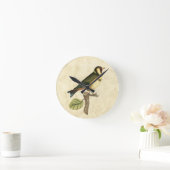 Gelbe und grüne Vögel auf einem kleinen Zweig Runde Wanduhr (Zuhause)