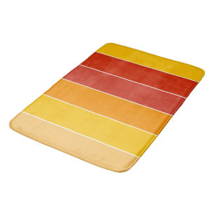 Gelbe und orangefarbene Streifen des mittleren Jah Badematte