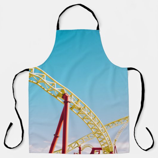 Gelbe und rote Rolle Untersetzer unter blauem Himm Schürze (Vorderseite)