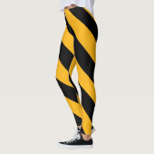 Gelbe und schwarze Diagonalstreifen Leggings (Links)