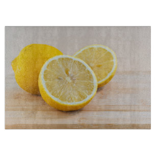 Gelbe Zitronen-Frucht-Fotografie Stillleben Schneidebrett