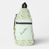 Gelbe Zitronen und Blätter im grünen Hintergrund Crossbody Bag (Vorderseite)