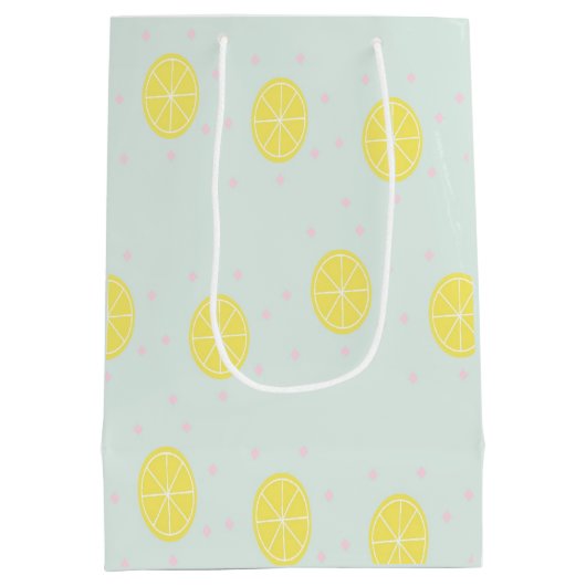 Gelbe Zitronenscheiben auf blau Mittlere Geschenktüte (Rückseite)
