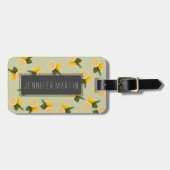 Gelbe Zitrusfrucht-Zitronen-Frucht auf blassem Gepäckanhänger (Vorderseite horizontal)