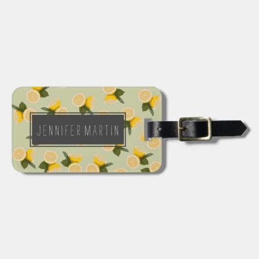 Gelbe Zitrusfrucht-Zitronen-Frucht auf blassem Gepäckanhänger (Vorderseite horizontal)