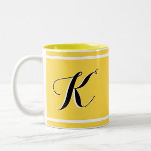 Gelbe zweifarbige Kaffeetasse mit Monogramm