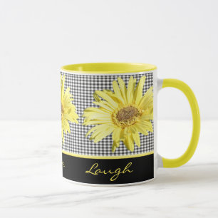 Gelber Gerbera und Schwarzes Live, Liebe, Tasse