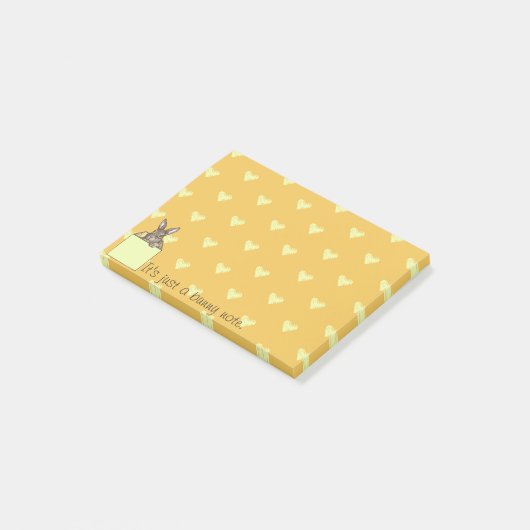 Gelber Hase in der Schachtel Post-it Klebezettel (angewinkelt)