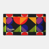 Gelber Name, bunte geometrische Formen Schreibtischunterlage (Vorderseite)