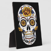 Gelber Rosenzucker-Schädel auf schwarz Fotoplatte (Seite)