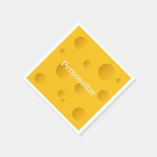 Gelber Schweizer Käseschnitt mit Löchern eigens lu Serviette (Ecke)