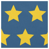 gelber Stern Blau Hintergrund Stoff (Nahaufnahme)