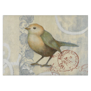 Gelber und grüner Spatz auf Vintagem Hintergrund Schneidebrett