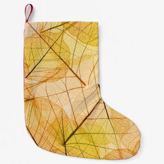Gelber und orangefarbener Hintergrund des Herbstes Kleiner Weihnachtsstrumpf