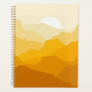 Gelber und orangefarbener Sonnenaufgang Planer