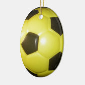 Gelber und schwarzer Fußball. Keramik Ornament (Links)