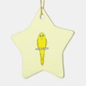 Gelber Vogel. Kanarienvogel Keramikornament (Links)