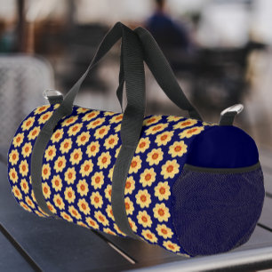 Gelbes Dahlia-Blumenmuster auf blau Duffle Bag