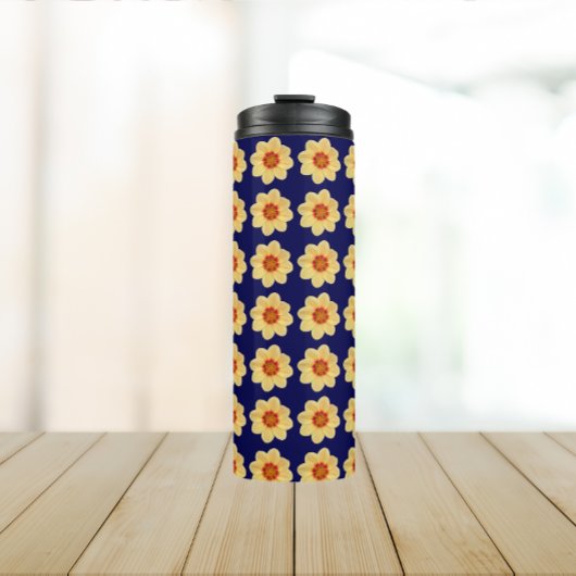 Gelbes Dahlia-Blumenmuster auf blau Thermosbecher