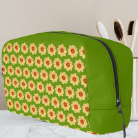 Gelbes Dahlia-Blumenmuster auf Grün