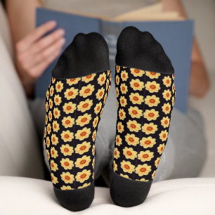 Gelbes Dahlia-Blumenmuster auf schwarz Socken