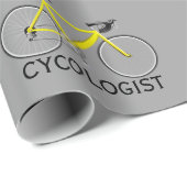 Gelbes Fahrrad mit Text des Zykologen auf Grau Geschenkpapier (Rolleneckpunkt)