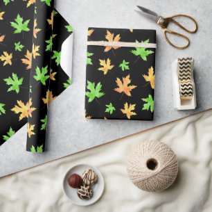 Gelbes, grünes, schwarzes Ahornblattmuster Geschenkpapier