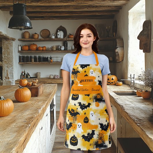 Gelbes Halloween mit Gespenstern, Pumpkins und Fle Schürze