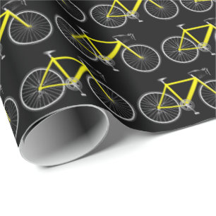 Gelbes Rad auf schwarzem Wrapping Paper Geschenkpapier