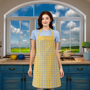 Gelbweißer Koch trägt den Musternamen Schürze