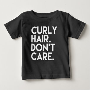 Gelocktes Haar interessieren sich nicht lustiges Baby T-shirt
