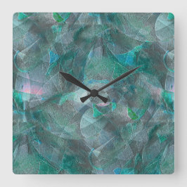 Gemeiner Zyan über unvollendetem Wandputz Quadratische Wanduhr