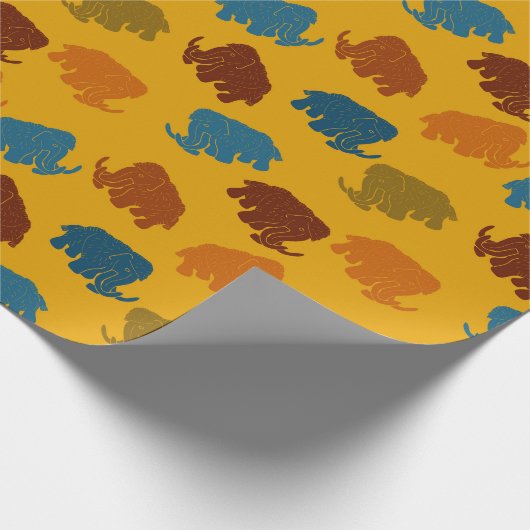 Gemusterte goldfarbene, blaue, oranfarbene Wollmam Geschenkpapier (Ecke)