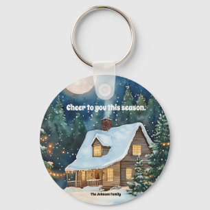 Gemütliche Weihnachtsfeier Hütte mit Schnee bedeck Schlüsselanhänger